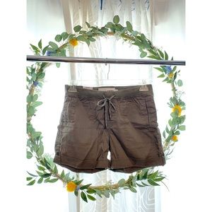 Olive green shorts.